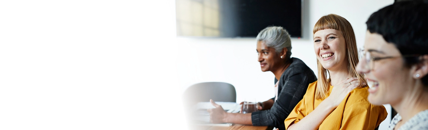 Women smiling and talking