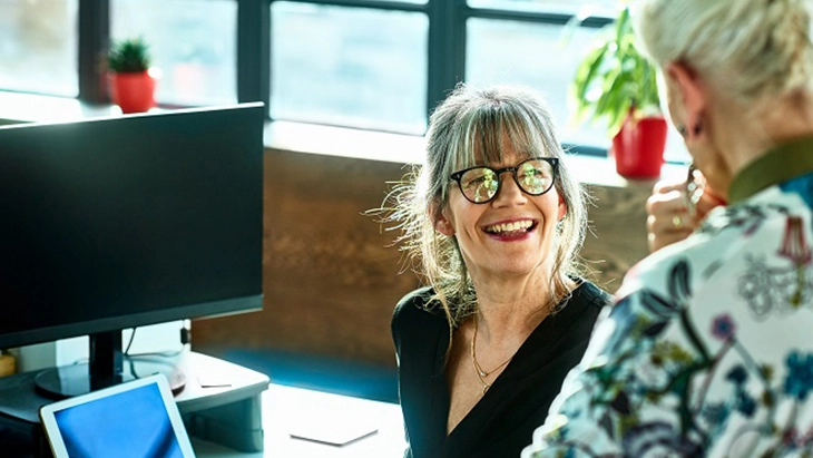 Two colleagues working in an office