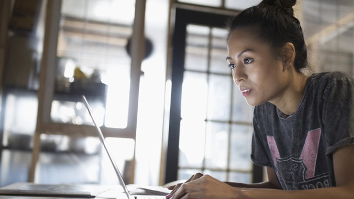 Lady working on a laptop