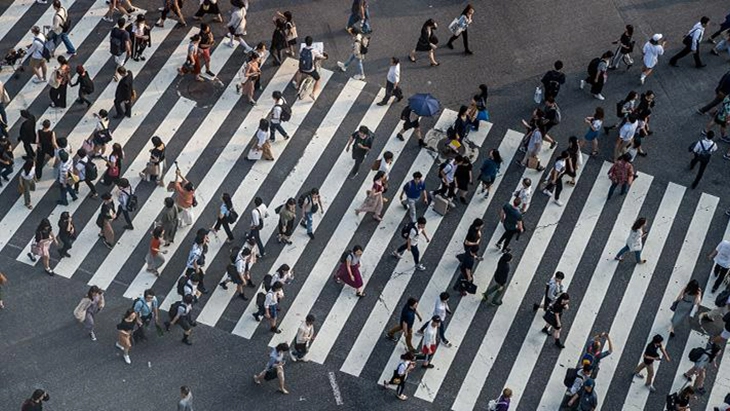 Overhead view of a crowd of people walking